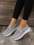 Floral Embroidered Flyknit Sneakers