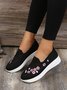 Floral Embroidered Flyknit Sneakers