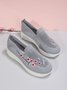Floral Embroidered Flyknit Sneakers